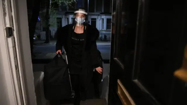 Secret Spa spray tan artist Magdelaine Gibson arrives in Balham, south London, where she has been booked for a midnight appointment to spray tan a group of clients