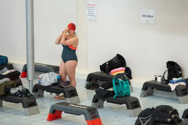 A swimmer getting ready at Clissold Leisure Centre in north London