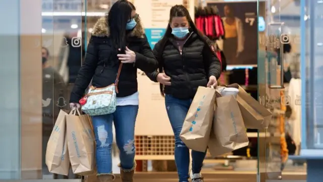 Shoppers leaving the Primark