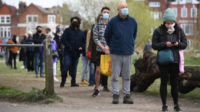 People queue for testing on Clapham Common