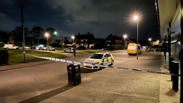 Police tape in Swarcliffe