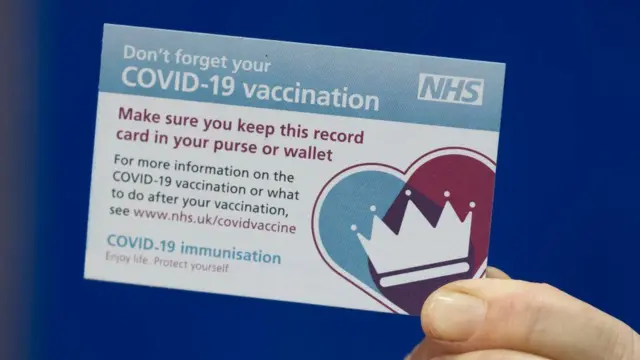 A Covid vaccination card