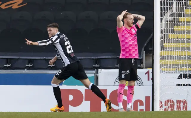 St Mirren's Marcus Fraser wheels away in celebration of his late winner as David Carson and Inverness suffer a knockout blow