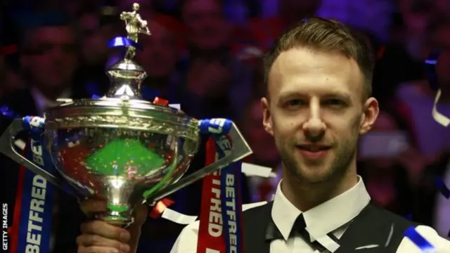 Judd Trump with his 2019 World Championship trophy