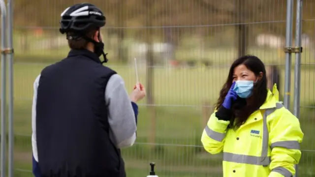 A person getting a coronavirus test at a test site in Clapham Common