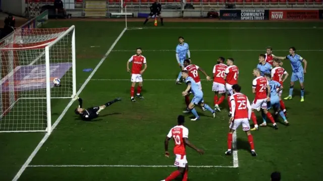 Coventry City"s Leo Ostigard scores their side"s first goal of the game