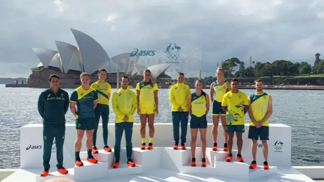 Australian Olympians pose in front of the Sydney Opera House at the unveiling of the team uniforms for the Tokyo Olympics