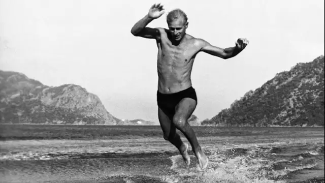 The Duke of Edinburgh jumping off his water skis