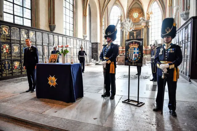 The shield of Britain's late Prince Philip, Duke of Edinburgh, of the Royal Order of the Seraphim is displayed during a ceremony in his honour and a one hour bell ringing at the Riddarholmen Church in Stockholm