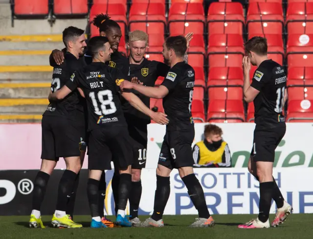 Livingston celebrate a fantastic goal at Pittodrie