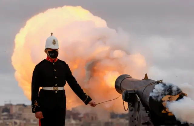 Re-enactors of the Malta Heritage Trust fire a nine-gun salute to honour Prince Philip before his funeral