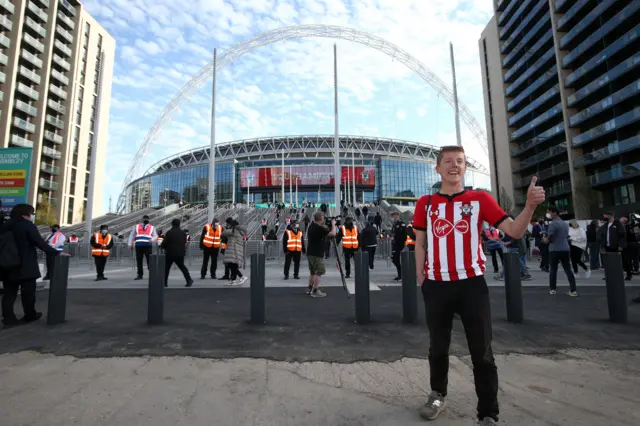 A Southampton fan outside the stadium ahead of the FA Cup semi final match at Wembley Stadium