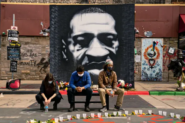 People gather in George Floyd Square for an AAPI and Black solidarity rally on Sunday, April 18, 2021 in Minneapolis, MN