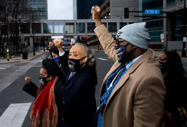 Rep. Sheila Jackson Lee (D-TX), Rev. Al Sharpton and Philonise Floyd, brother of George Floyd, arrive at the Hennepin County Government Center on April 19, 2021 in Minneapolis, Minnesota. Closing arguments are scheduled today in the Derek Chauvin murder trial. The former Minneapolis Police officer is accused of killing George Floyd last May.