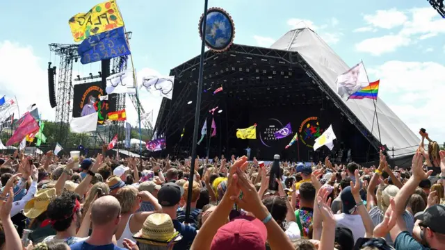 A crowd at Glastonbury's Pyramid Stage