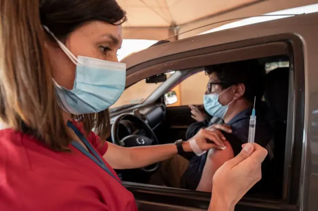 Man gets vaccinated in Chile