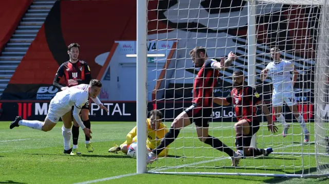 Steve Cook clears off the line