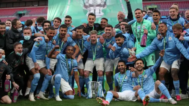 Manchester City celebrate their EFL Cup win