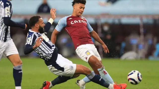 Ollie Watkins shoots at goal