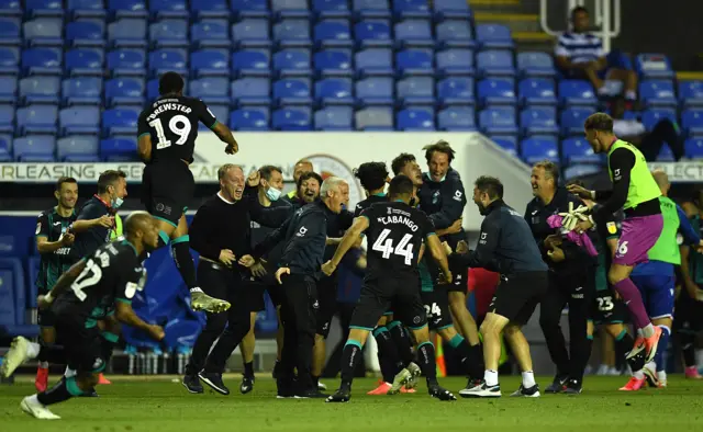 Swansea celebrate at the Madejski Stadium in July 2020