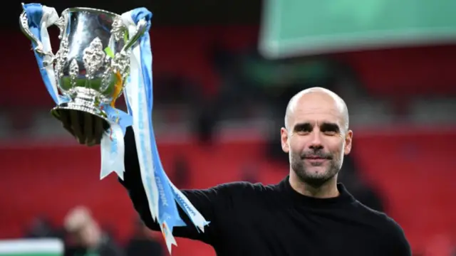 Pep Guardiola lifts the Carabao Cup