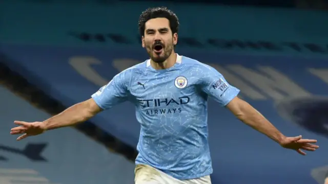 Ilkay Gundogan celebrates scoring against Tottenham