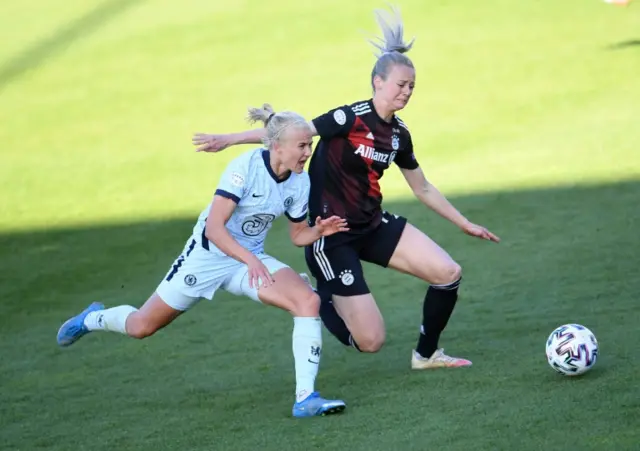 Chelsea's Pernille Harder challenges Bayern Munich"s Amanda Ilestedt