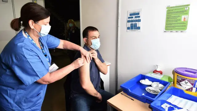 Man being vaccinated