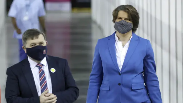 Arlene Foster and Robin Swann at vaccination centre