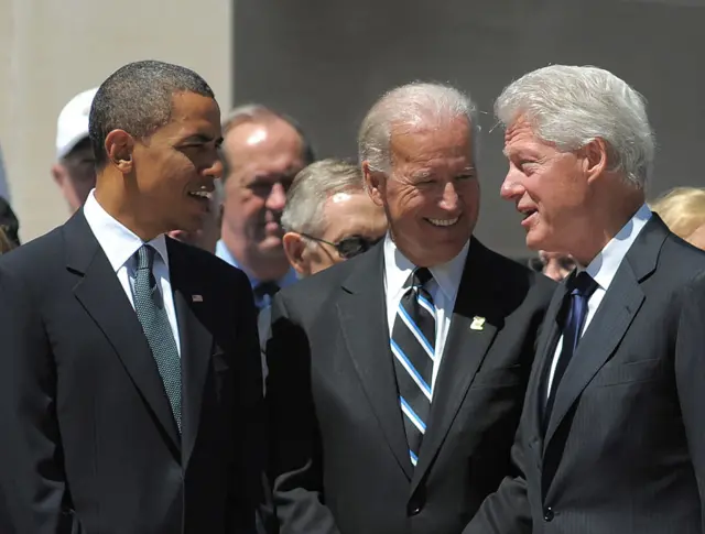 Barack Obama, Joe Biden and Bill Clinton speak at an event