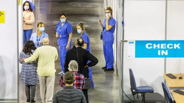 People at a vaccine centre