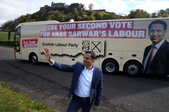 Anas Sarwar in front of Labour's 'second vote' election bus