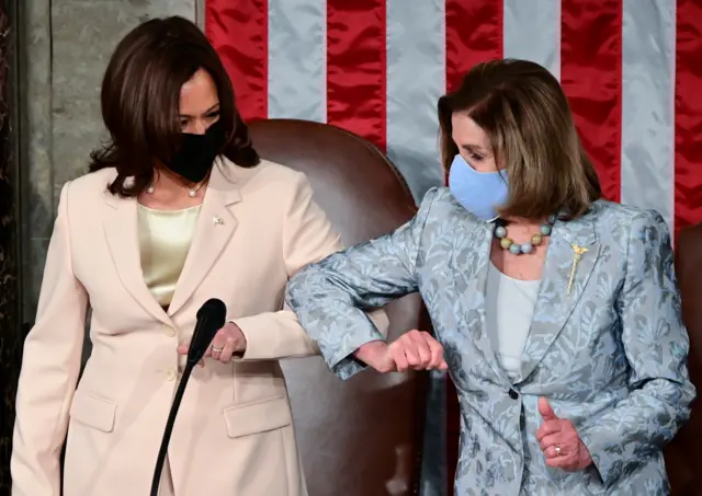 US Vice-President Kamala Harris greets Speaker Nancy Pelosi