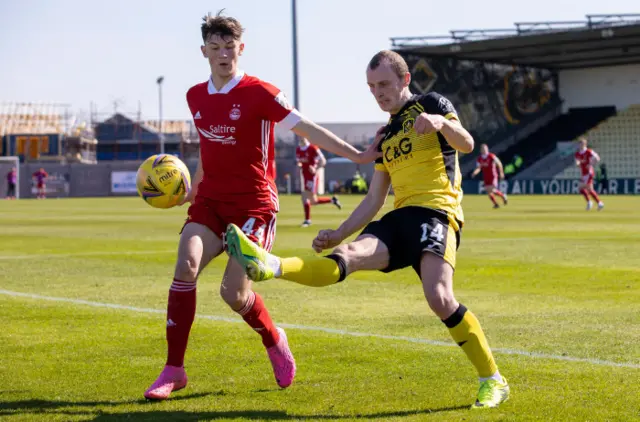 Aberdeen's Calvin Ramsay and Dumbarton's Jamie Wilson