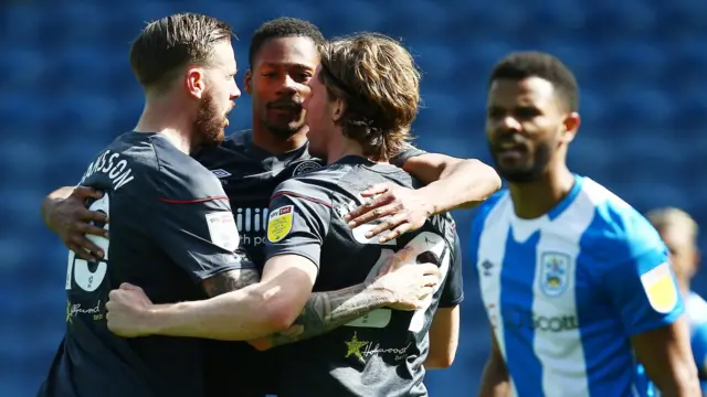 Brentford's Mads Sorensen celebrates scoring with Pontus Jansson and Ethan Pinnock