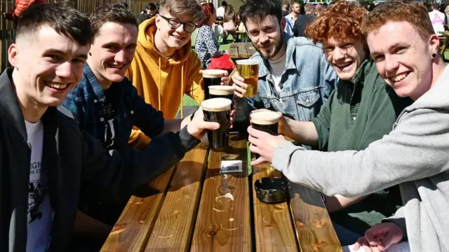 A group of men having drinks