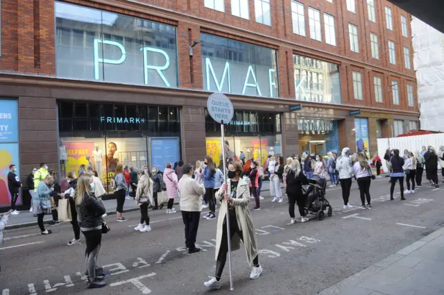 Shoppers queuing outside Primark