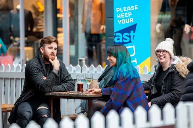 People drinking outside in Belfast