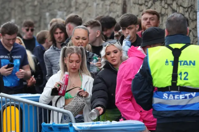 A queue of people at Bramley Moore Dock