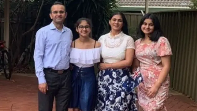 Mandeep Sharma (left) and his family