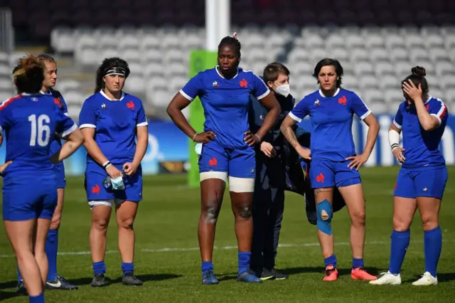 France look dejected after defeat by England