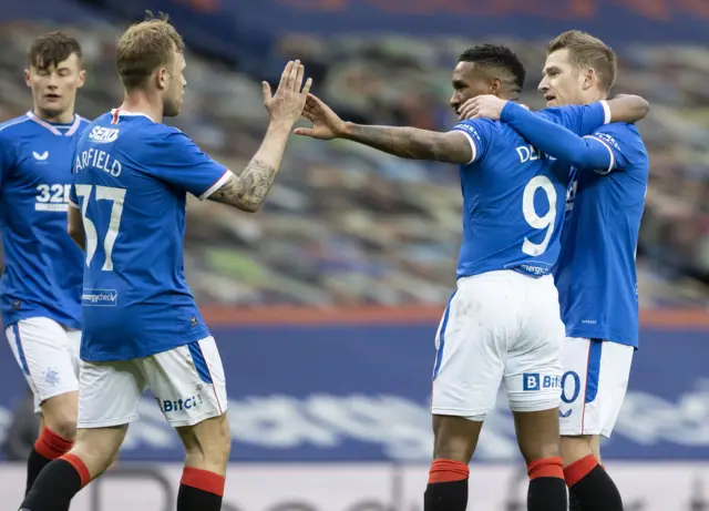 Rangers' Jermain Defoe (centre) celebrates making it 1-0