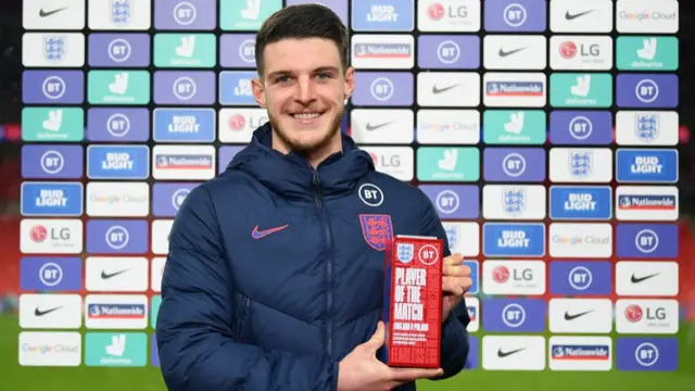 Declan Rice with his player of the match award following England's victory against Poland