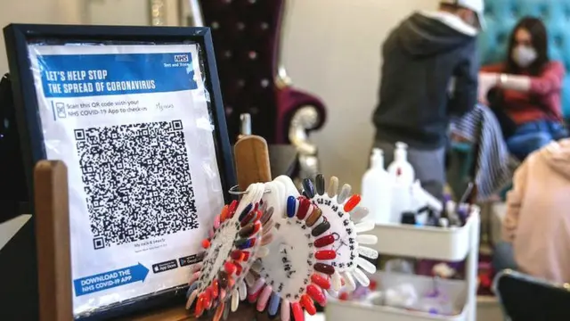 A QR code check in at a nail bar