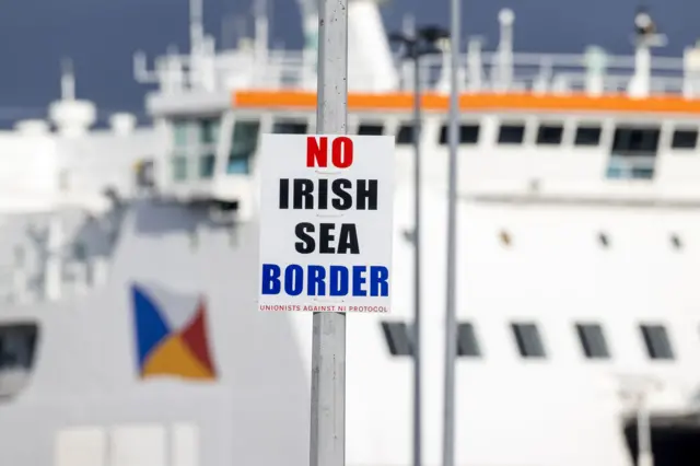 A sign protesting against the Irish Sea border at Larne Port