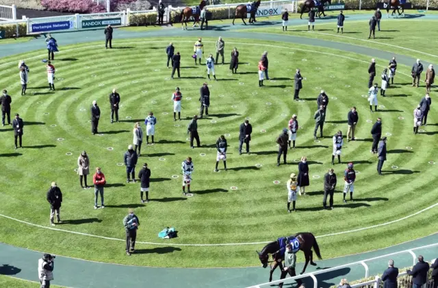 Jockey and trainers observe a two-minute silence