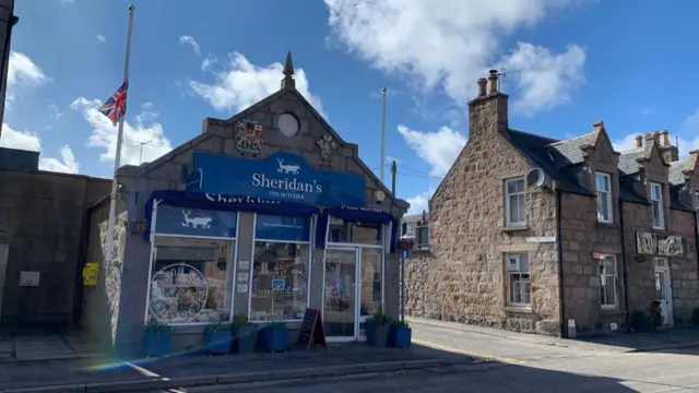 Butcher's shop Sheridan‘s flying its flag at half mast