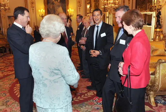 The Duke of Edinburgh and Her Majesty The Queen meet Michael Palin in 2011