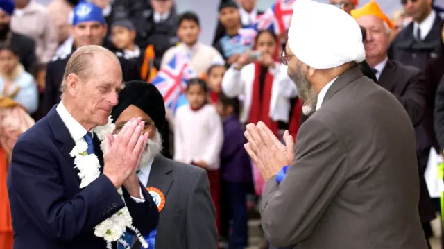 Prince Philip Giving The Namaste Yogic Greeting At The Opening Of Phase 2 Of The Gurdwara Sri Guru Singh Sabha Sikh Temple.