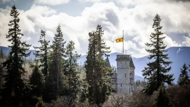 The Lion rampant flying at half mast at Balmoral Castle in Scotland